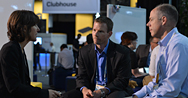 Attendees sit together and network in the Clubhouse.