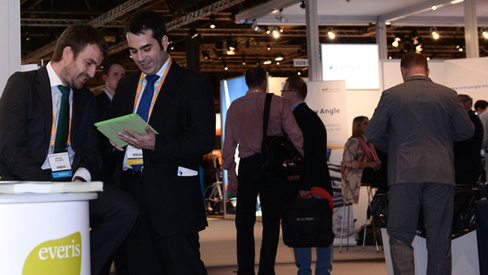 Attendees visit exhibitors at SAP TechEd